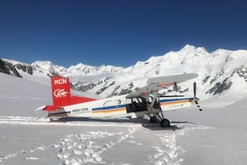 a airplane that is covered in snow