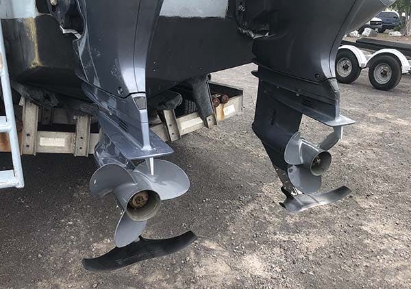 outboard boat motors bottom half with propeller guards installed 