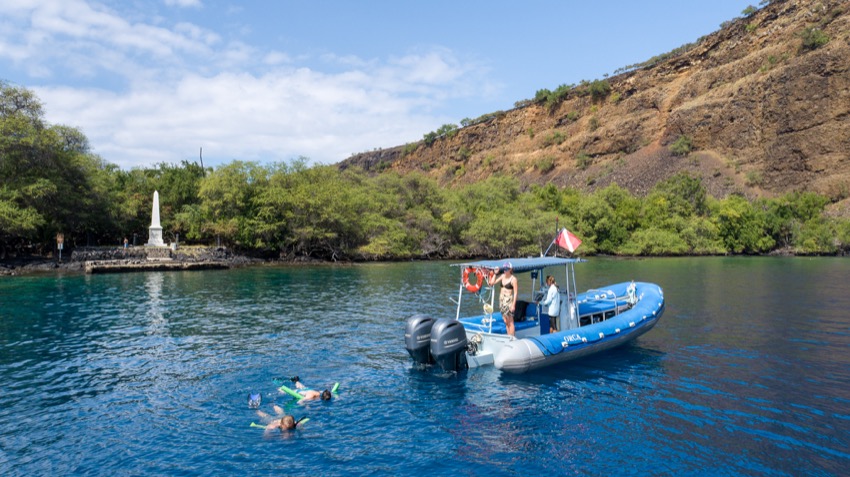 a small boat in a body of water