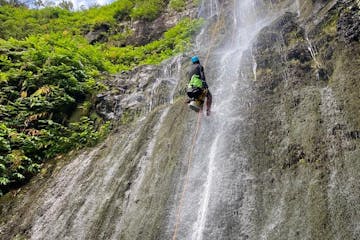 a man riding on the back of a waterfall