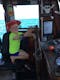 kid steering shaolin junk boat