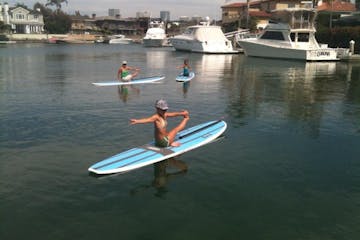 yoga class on paddle board