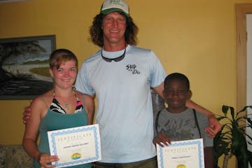 two kids with an instructor