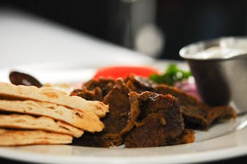 Steak and pita on a plate