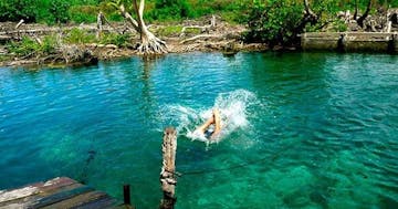 woman swimming at Holbox Island