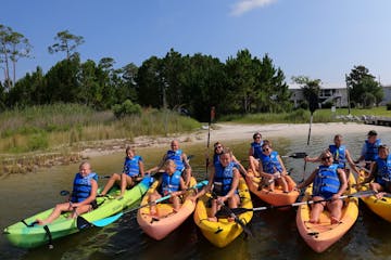 a group of people kayaking
