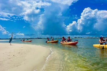 a group of people on a kayak in the water