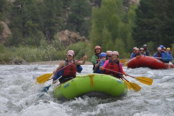 group rafting down a river