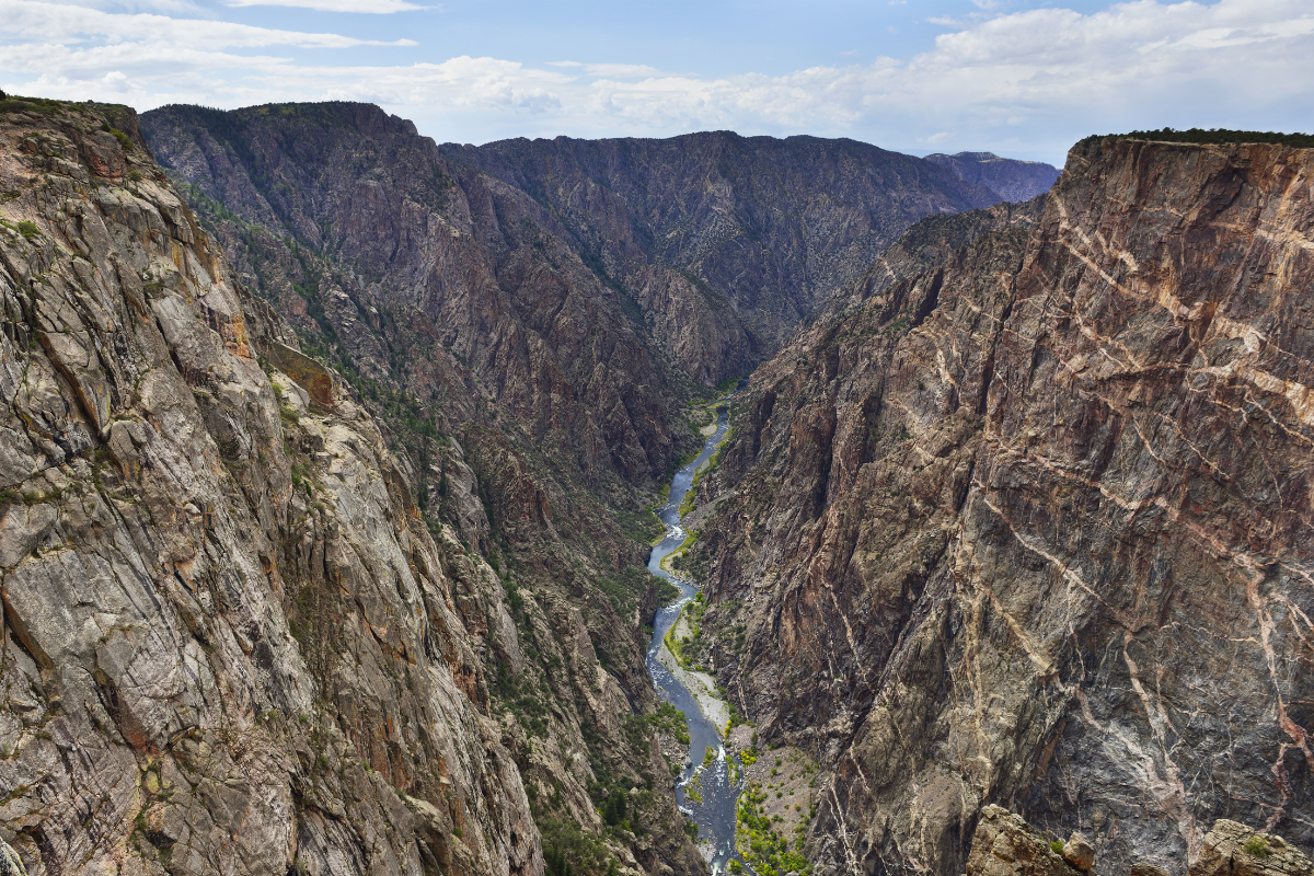 a canyon with Black Canyon of the Gunnison National Park in the background
