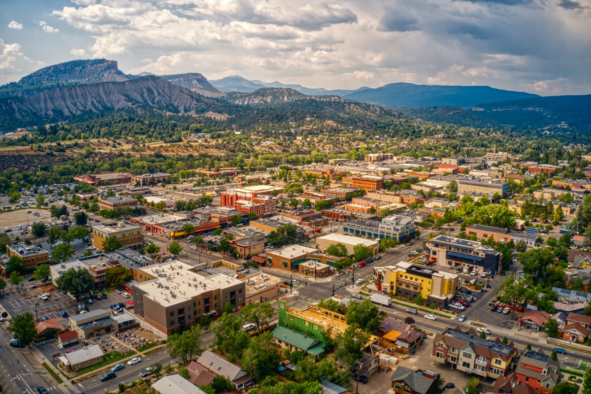 aerial view of durango, colorado with mountains in the background