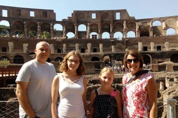 Family enjoying a tour in the Colosseum Rome