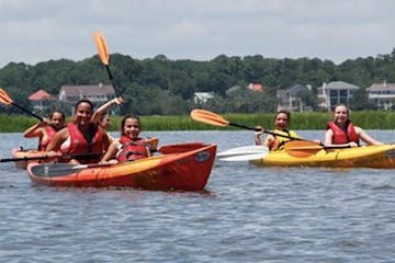 Group of people kayaking in the water