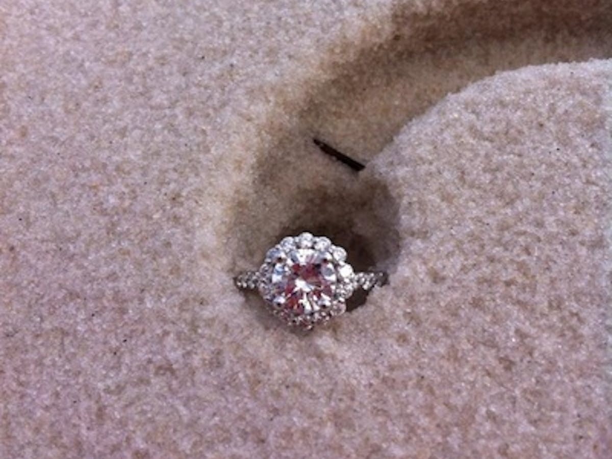 a wedding ring in the sand