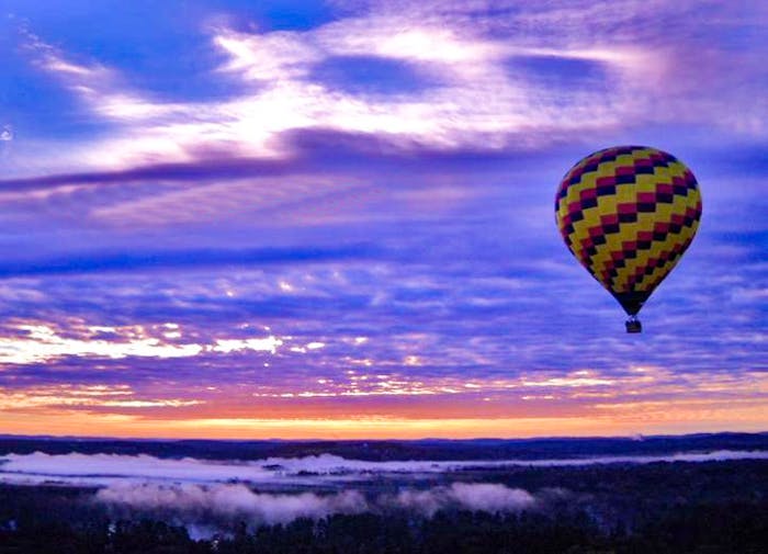 hot air balloons at sunrise