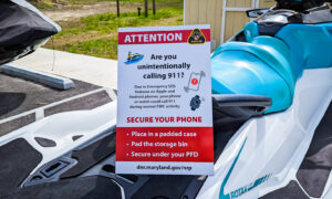 jet ski parked with a sign on it