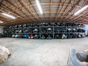 jetskis stored inside in a storage rack