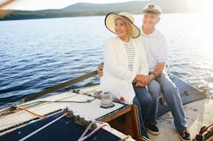 Elderly couple cherishing a romantic boat trip