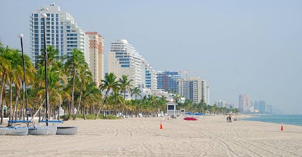 An image showing Fort Lauderdale beach sand and ocean.