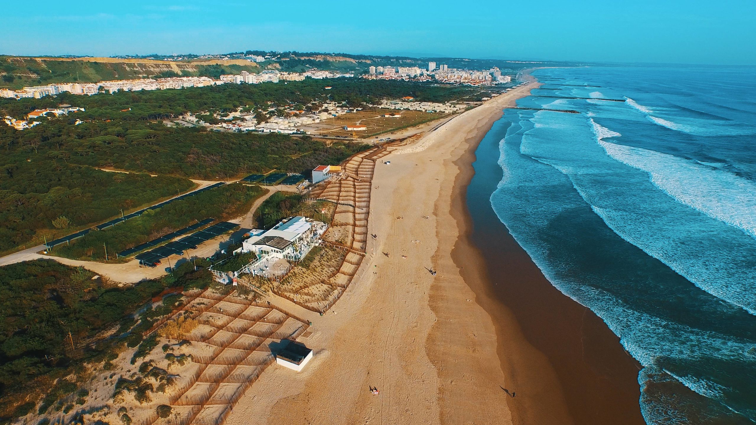 a view of a beach next to a body of water