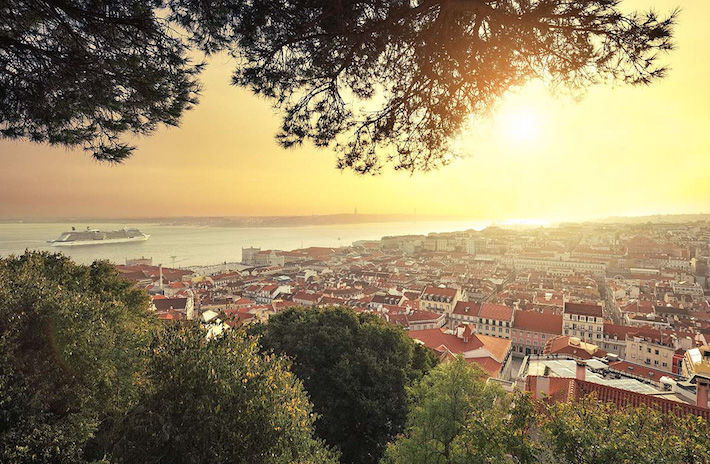 a view of a city next to a body of water