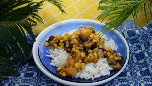 a plate of food with rice and vegetables