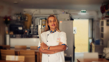 a person standing in a kitchen