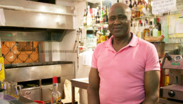 a person standing in a kitchen