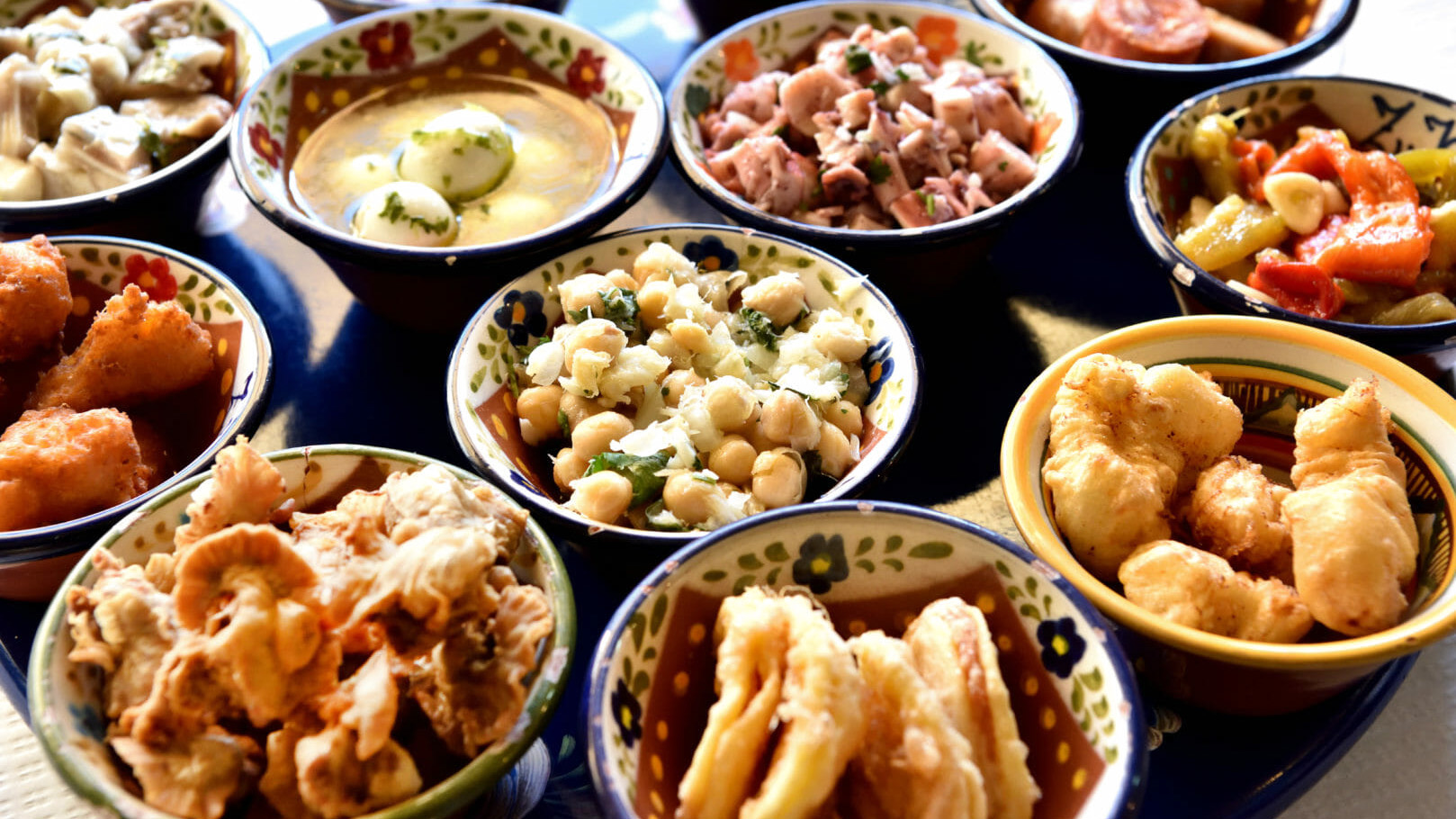 a bowl filled with different types of food on a table