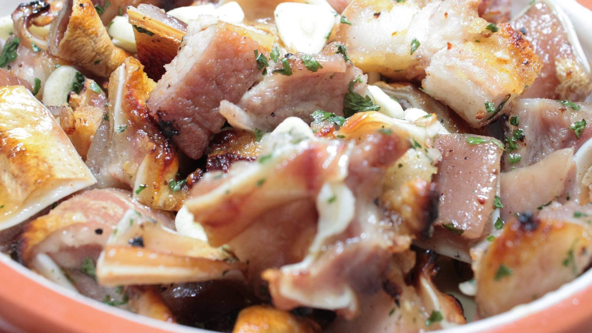 a plate of a Portuguese petisco made of pork ear.