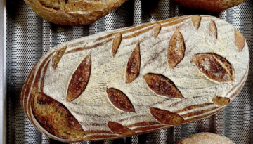 a close up of a basket of bread