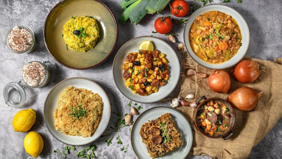 a bowl filled with different types of food on a table