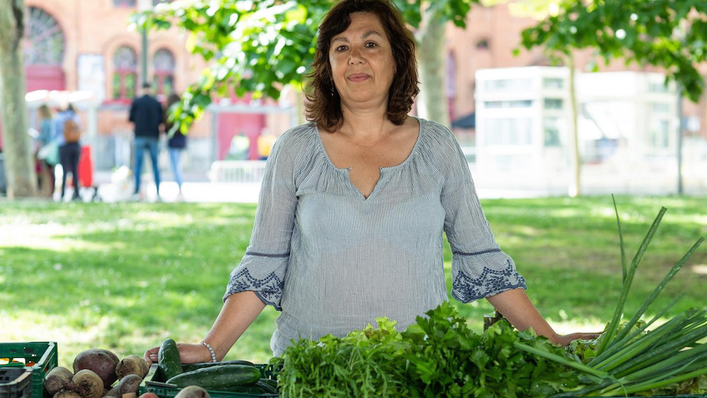 a person standing in a garden