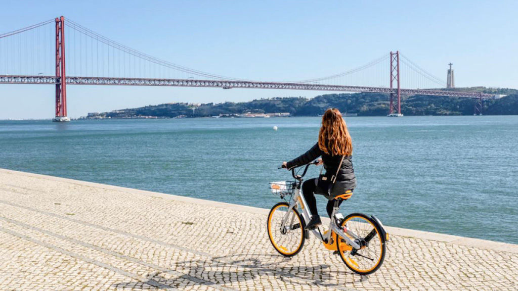 a bicycle next to a body of water