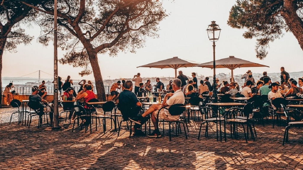 a group of people sitting at a table