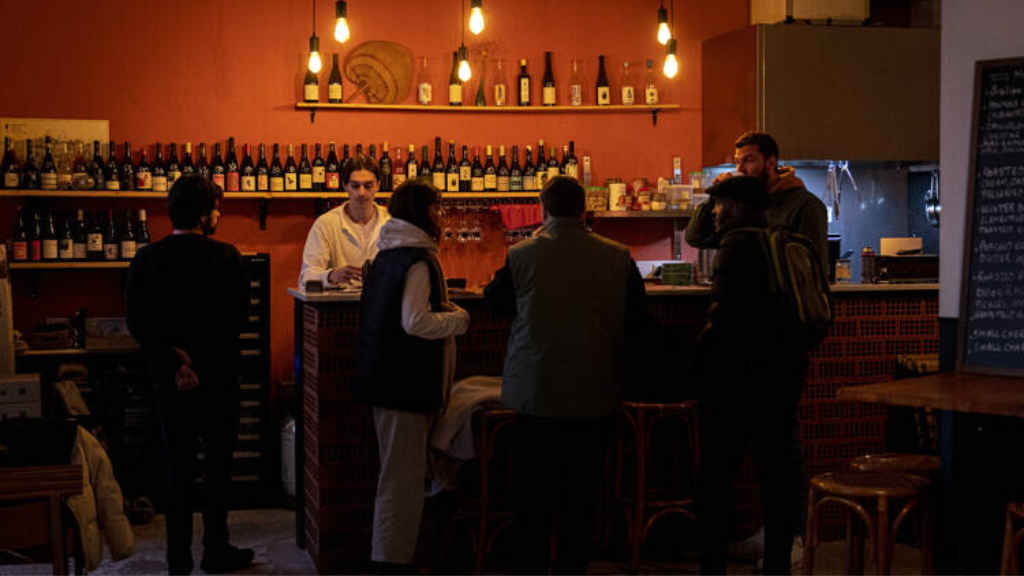 a group of people in a bar