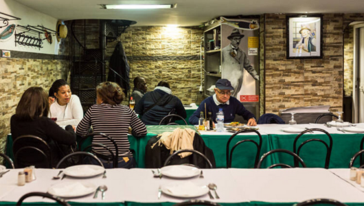 a group of people sitting at a table