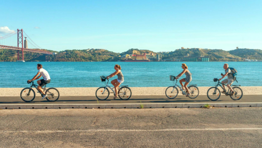 a bicycle next to a body of water