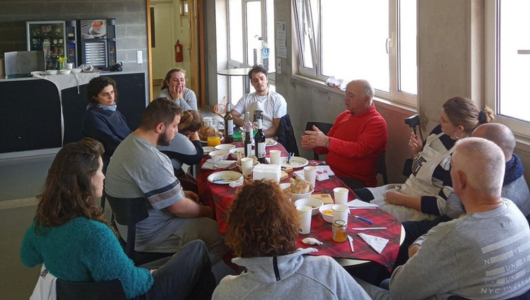 a group of people sitting at a table