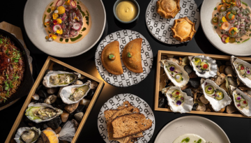 a bowl filled with different types of food on a plate