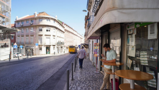 a group of people walking down a street