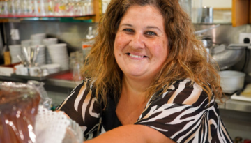 a woman smiling for the camera