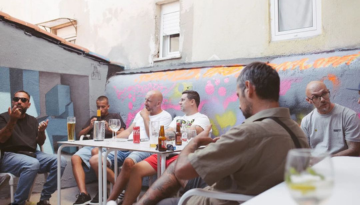 a group of people sitting at a table