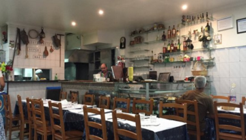 a kitchen with a dining table