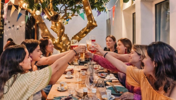 a group of people sitting at a table