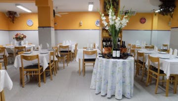 a dining room at Adega Fernando
