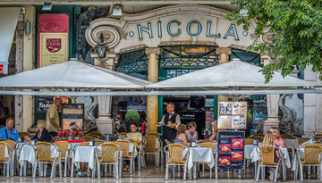 tables and chairs outside Café Nicola