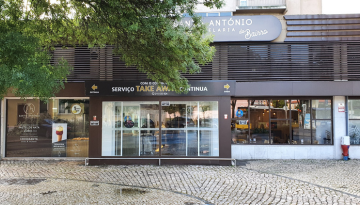 a close up of a street in front of a building