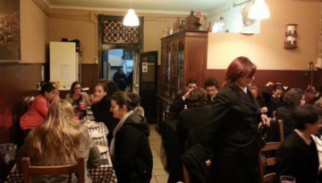 a group of people standing in a room