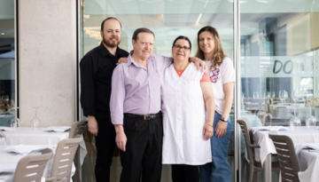 a group of people standing in a room