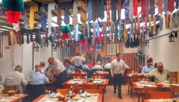 a group of people sitting at a table